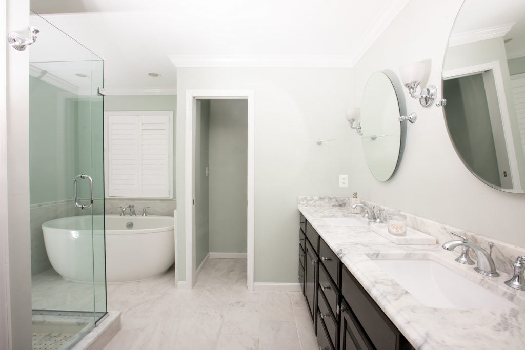 New bathroom remodel with white granite countertops